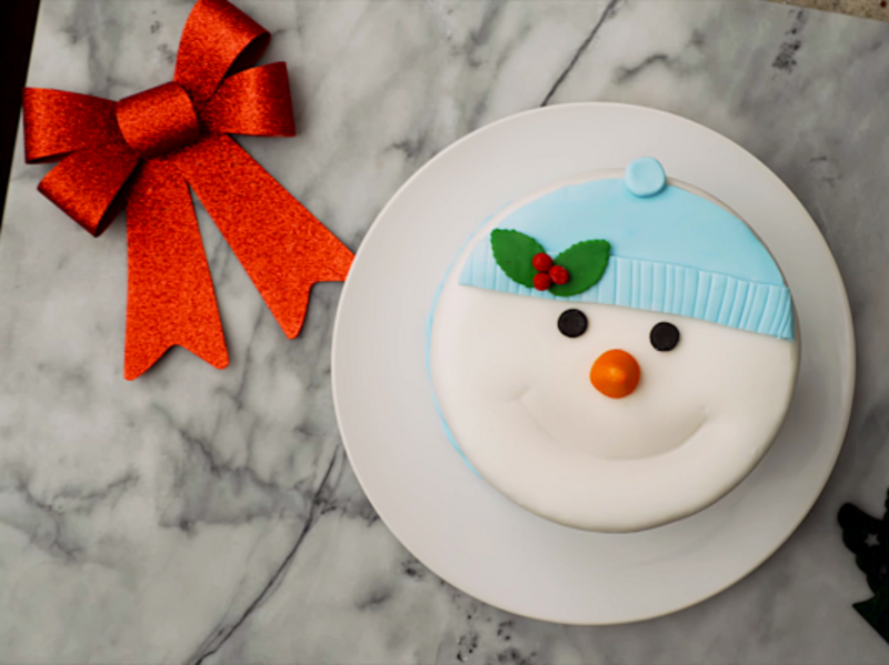 Image of Learn how to make this Mexican Chocolate Snowman Cake! article