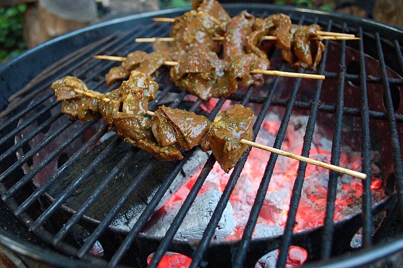 Anticuchos de corazón - Source: WikiCommons}</p>
<p>The anticuchos de corazón or beef hearts, already cut and rearrenged in three skewers, are inside a grill, getting cooked.</p>
<p>Best Country To Visit In South America